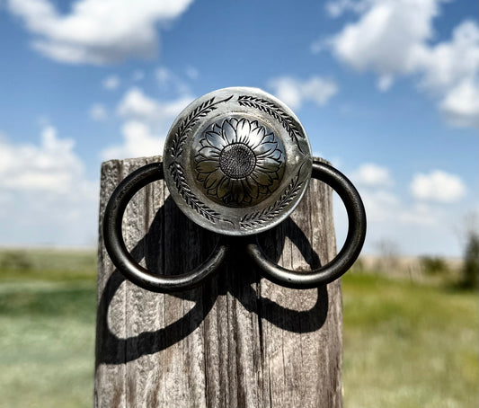 Butterfly with engraved sunflower concho